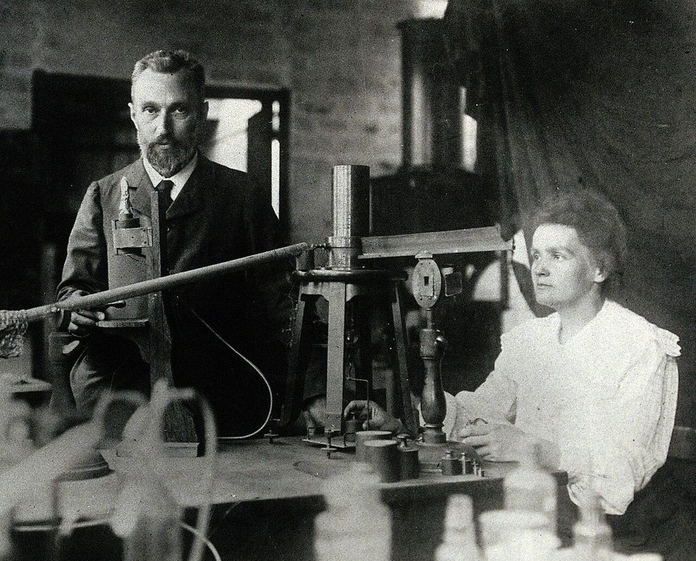 They married in 1895. No white dress; she bought a dark one she could wear in the laboratory.